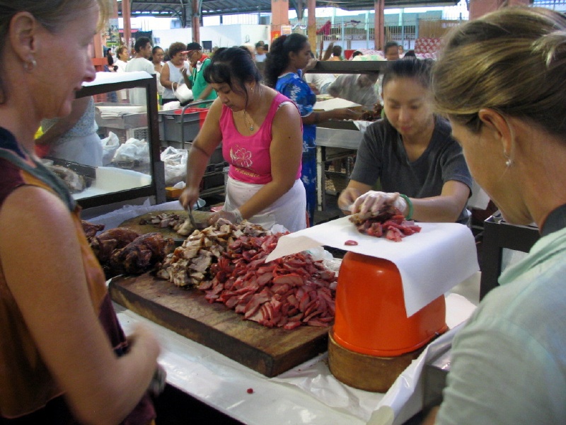 Buying some meat at the market.